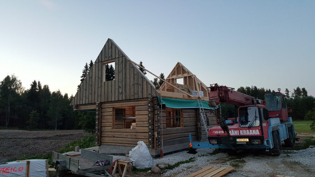 Log Sauna construction of roof installation