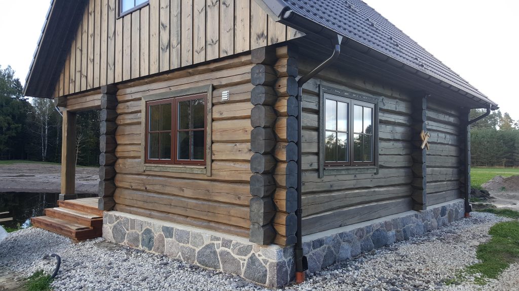 Log Sauna on the shore of the pond in Finland